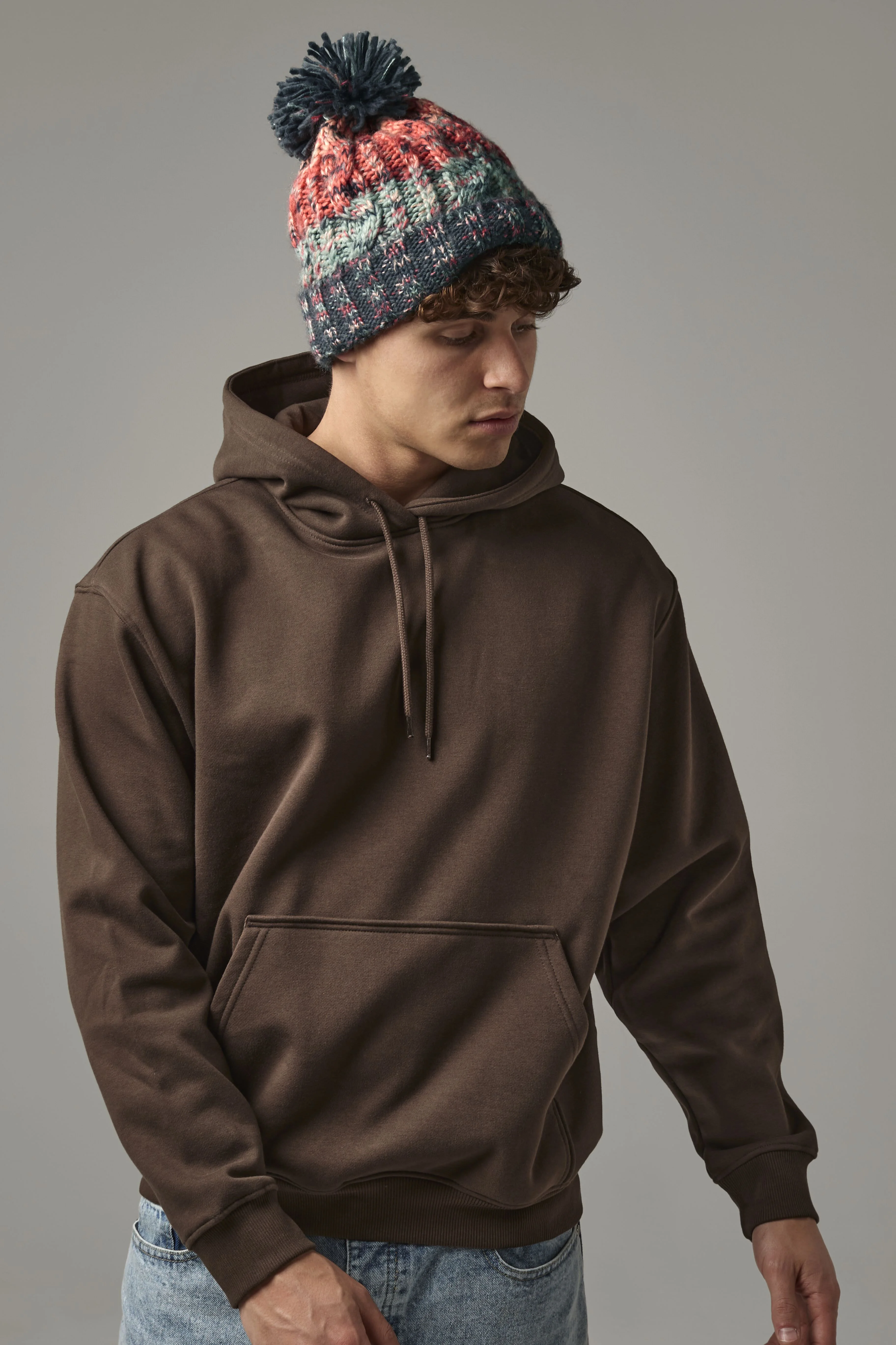 Corkscrew pom pom beanie