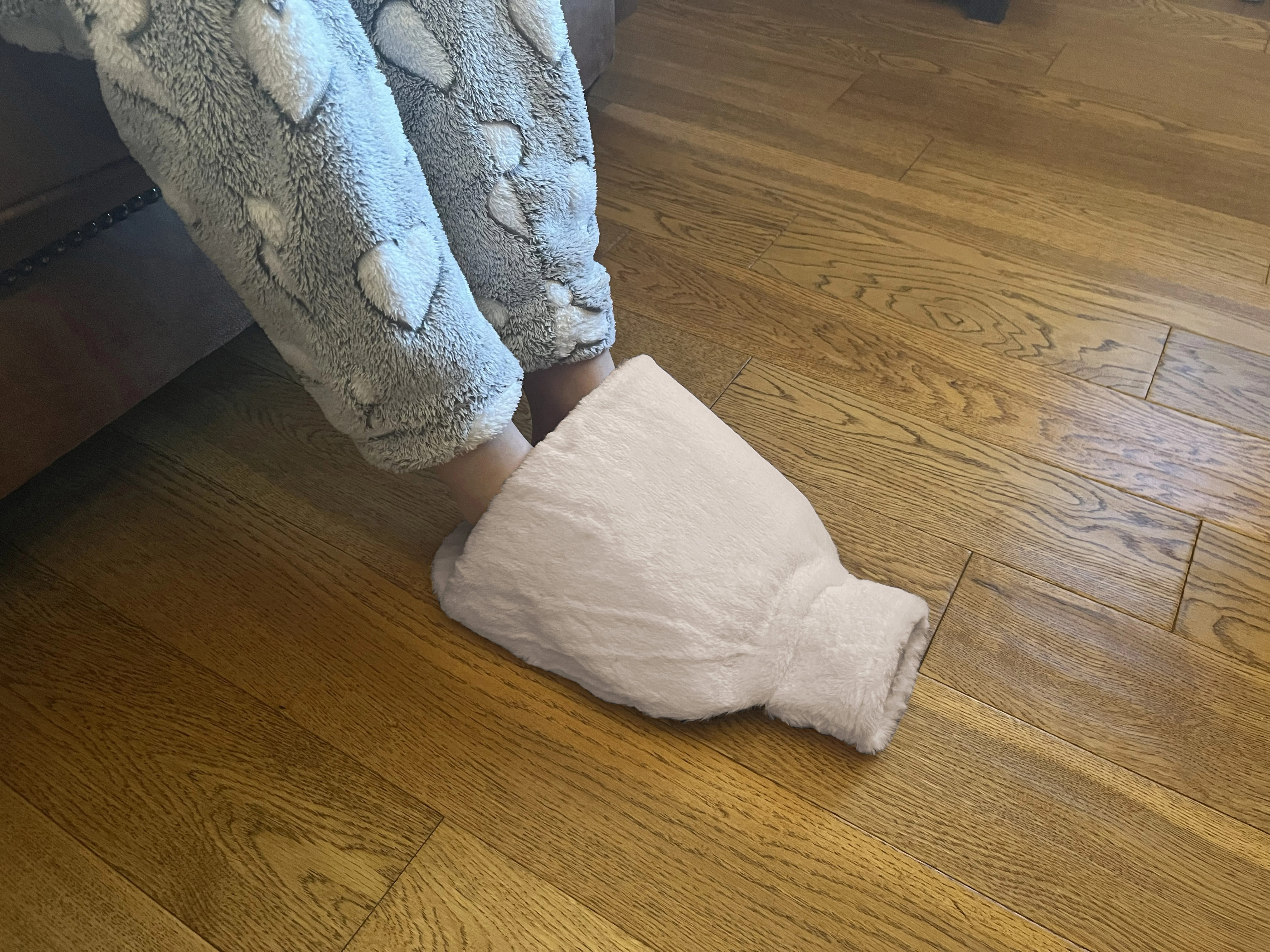Luxury foot hot water bottle and cover in plush faux fur